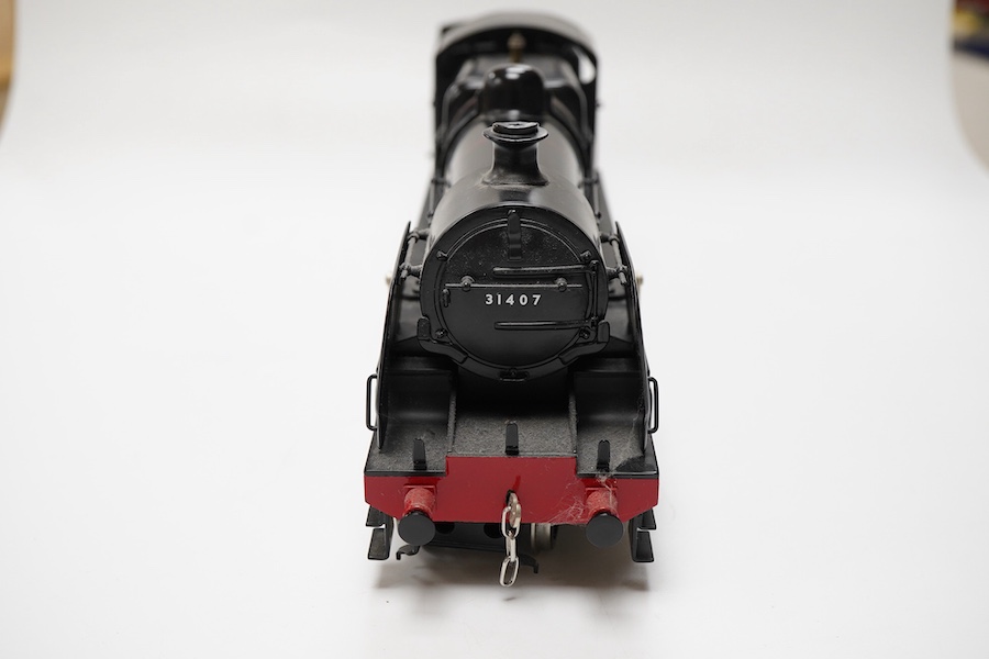 A boxed Bassett-Lowke by Corgi 0 gauge tinplate BR N class 2-6-0 tender locomotive, 31407, intended for two or three rail running (the pick ups for the centre rail and switch in the cab have been removed), (BL99004)